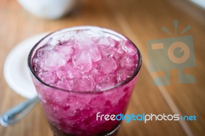 Fresh Juices With Fruits On Wooden Table Stock Photo