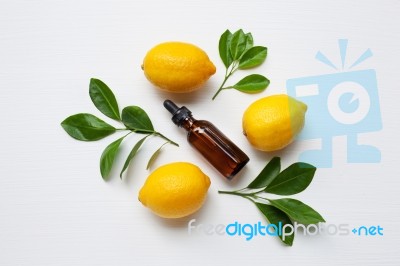 Fresh Lemon With Lemon Essential Oil Stock Photo