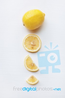 Fresh Lemon With Slices  On White Stock Photo