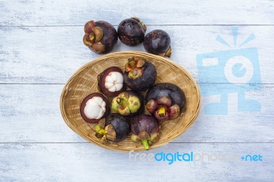 Fresh Mangosteen From Thailand In The Bamboo Basket Stock Photo