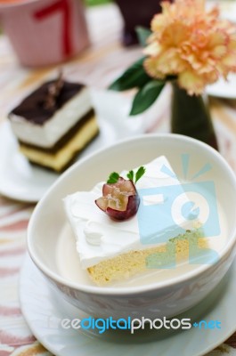 Fresh Milk Cake In Milk Bowl Stock Photo