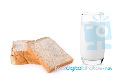 Fresh Milk In The Glass Wiht Whole Wheat Breadon White Backgroun… Stock Photo