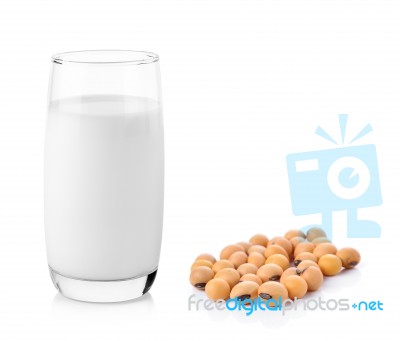 Fresh Milk In The Glass With Soy Beans On White Background Stock Photo