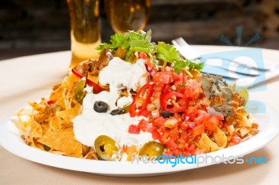 Fresh Nachos And Vegetable Salad With Meat Stock Photo