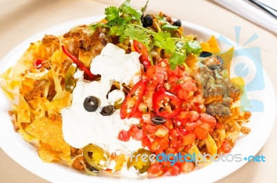 Fresh Nachos And Vegetable Salad With Meat Stock Photo