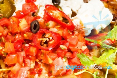 Fresh Nachos And Vegetable Salad With Meat Stock Photo