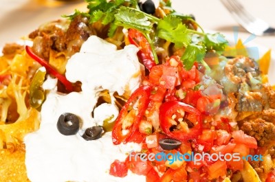 Fresh Nachos And Vegetable Salad With Meat Stock Photo