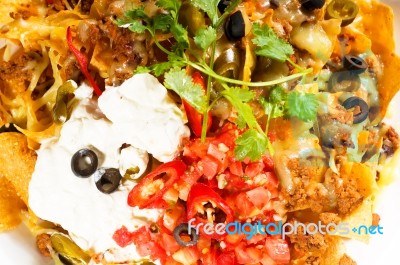 Fresh Nachos And Vegetable Salad With Meat Stock Photo