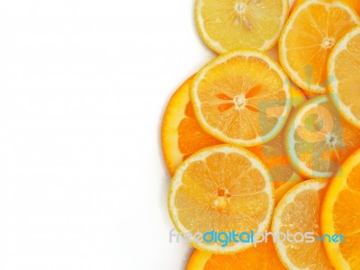 Fresh Orange And Lemon Slice On White Background Stock Photo