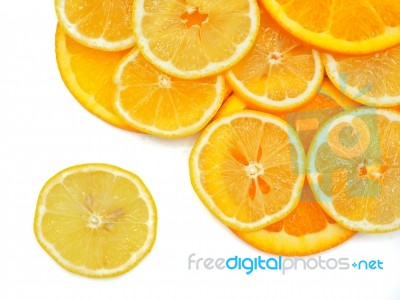 Fresh Orange And Lemon Slice On White Background Stock Photo