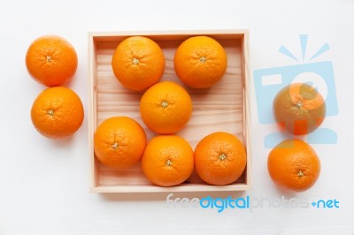 Fresh Orange Citrus Fruit In Wooden Box Stock Photo