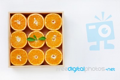 Fresh Orange Citrus Fruit In Wooden Box Stock Photo