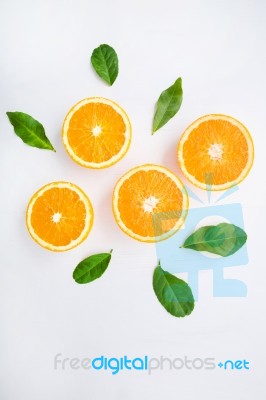 Fresh Orange Citrus Fruit On White Background. Top View Stock Photo