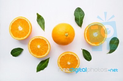 Fresh Orange Citrus Fruit On Wooden White Background. Top View Stock Photo