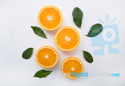 Fresh Orange Citrus Fruit On Wooden White Background. Top View Stock Photo