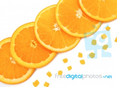 Fresh Orange Slice And Small Pieces On White Background Stock Photo