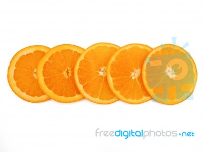 Fresh Orange Slice On White Background Stock Photo