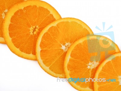 Fresh Orange Slice On White Background Stock Photo