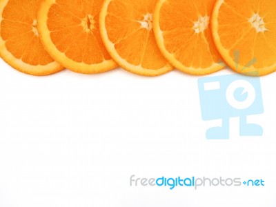 Fresh Orange Slice On White Background, With Copy Or Free Space Stock Photo