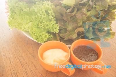 Fresh Organic Salad Meal With Dressing Stock Photo