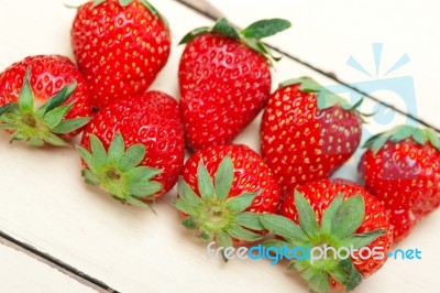 Fresh Organic Strawberry Over White Wood Stock Photo