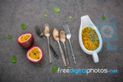 Fresh Passion Fruits Set Up On Dark Stone Background. Passion Fr… Stock Photo