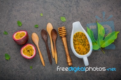 Fresh Passion Fruits Set Up On Dark Stone Background. Passion Fr… Stock Photo