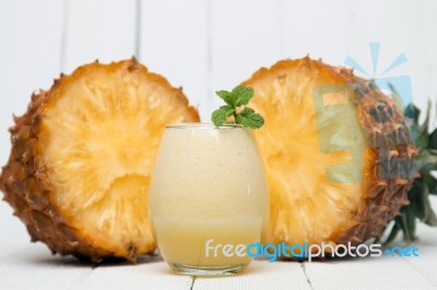 Fresh Pineapple Juice Isolated On A White Background Stock Photo