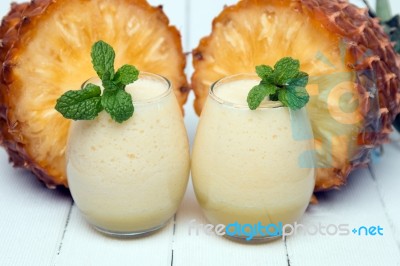 Fresh Pineapple Juice Isolated On A White Background Stock Photo