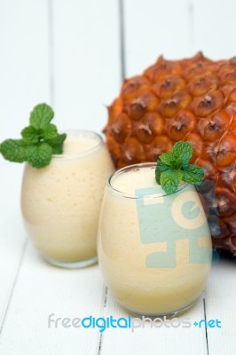 Fresh Pineapple Juice Isolated On A White Background Stock Photo