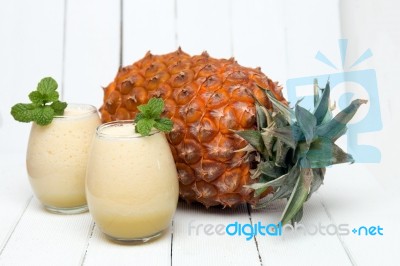 Fresh Pineapple Juice Isolated On A White Background Stock Photo