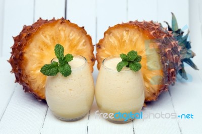 Fresh Pineapple Juice Isolated On A White Background Stock Photo