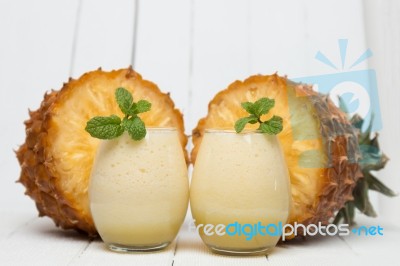 Fresh Pineapple Juice Isolated On A White Background Stock Photo