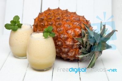 Fresh Pineapple Juice Isolated On A White Background Stock Photo