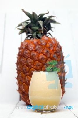 Fresh Pineapple Juice Isolated On A White Background Stock Photo