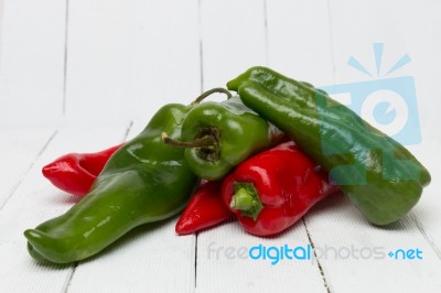 Fresh Red And Green Cayenne Peppers Stock Photo