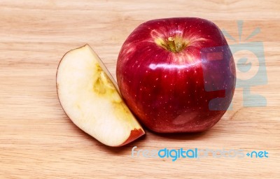 Fresh Red Apple On Wood Background Stock Photo