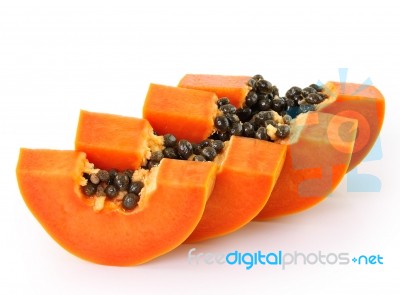 Fresh Ripe Juicy Papaya Slice On White Background Stock Photo