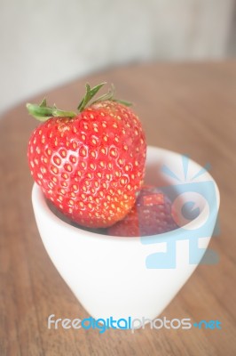 Fresh Ripe Strawberries On Wooden Background Stock Photo