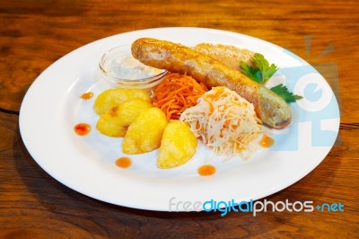 Fresh Sausages With Vegetables Stock Photo