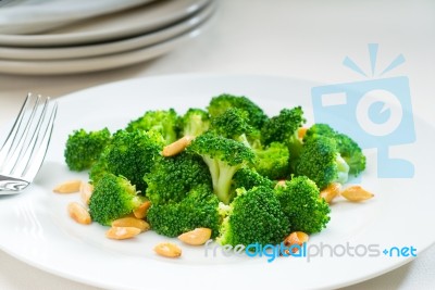 Fresh Sauteed Broccoli And Almonds Stock Photo