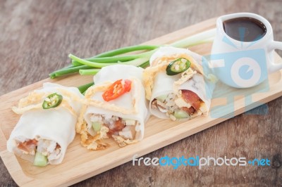 Fresh Spring Rolls On Wooden Table Stock Photo