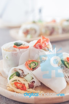 Fresh Spring Rolls On Wooden Table Stock Photo