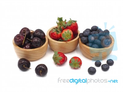 Fresh Summer Fruits, Cherry, Strawberry, And Blueberry In Wooden… Stock Photo