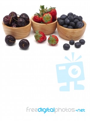 Fresh Summer Fruits, Cherry, Strawberry, And Blueberry In Wooden… Stock Photo