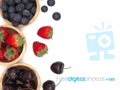 Fresh Summer Fruits, Cherry, Strawberry, And Blueberry In Wooden… Stock Photo