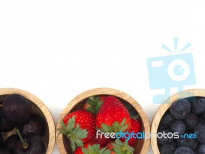 Fresh Summer Fruits, Cherry, Strawberry, And Blueberry In Wooden… Stock Photo