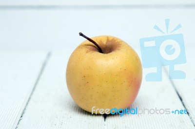 Fresh Tasty Yellow Apple Fruit Isolated On A White Background Stock Photo