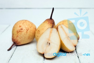 Fresh Tasty Yellow Pear Fruits Isolated On A White Background Stock Photo