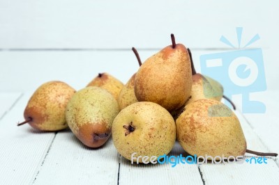 Fresh Tasty Yellow Pear Fruits Isolated On A White Background Stock Photo